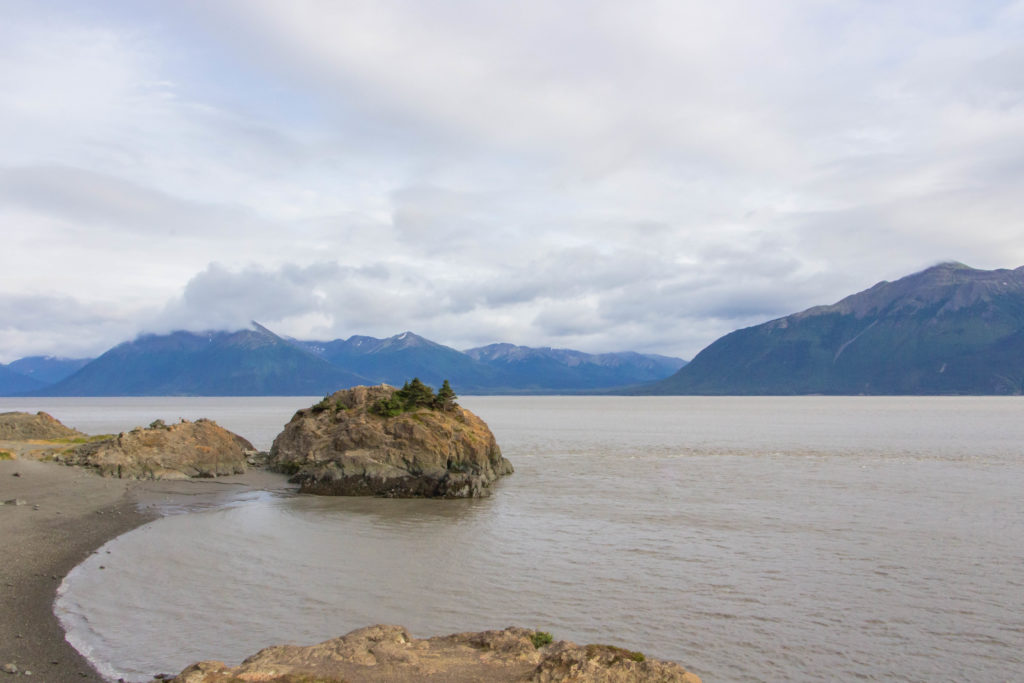 Beluga Point at Turnagin arm near anchorage alaska with mountains, water, and blue sky