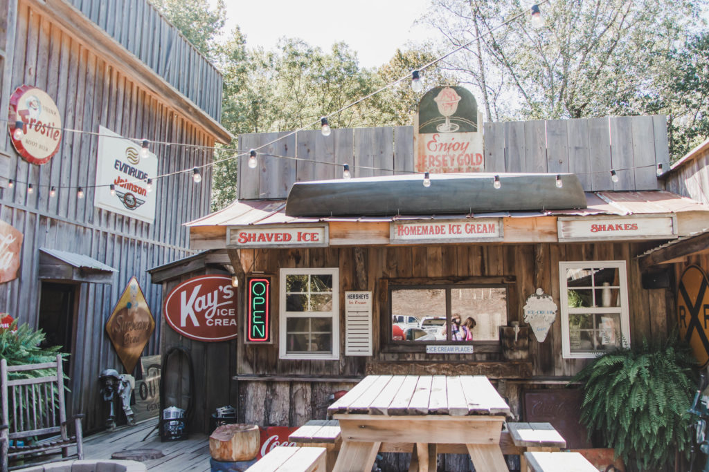 rustic ice cream shop and shaved ice with picnic table at the outpost pickwick savannah tennessee